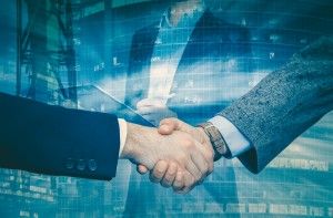 Handshake confirming business partnership